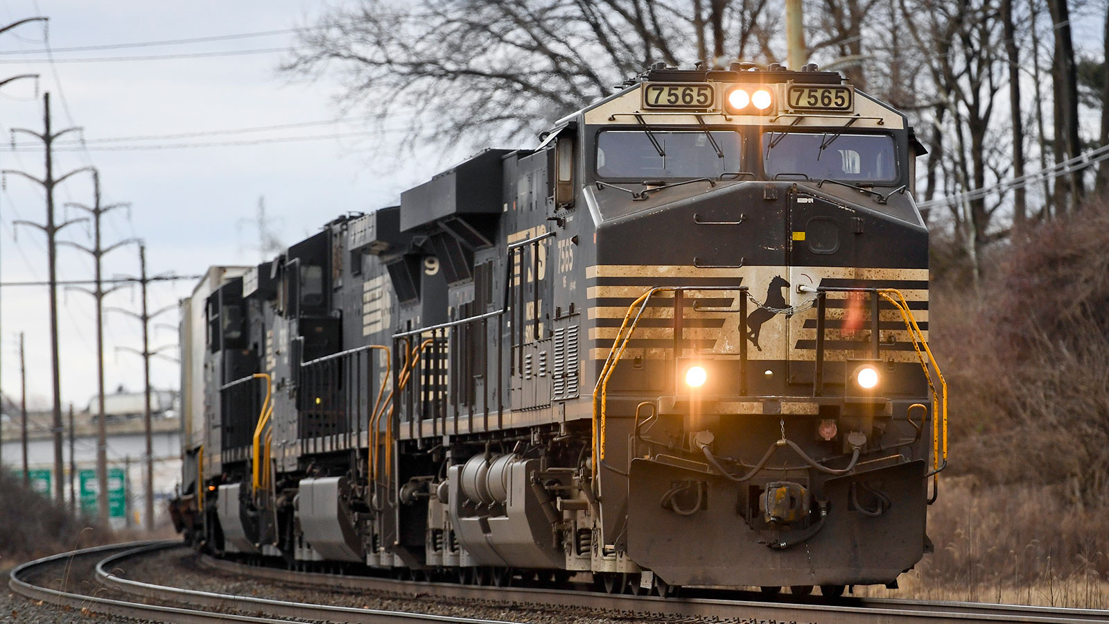 Norfolk Southern diesel train riding along the track.